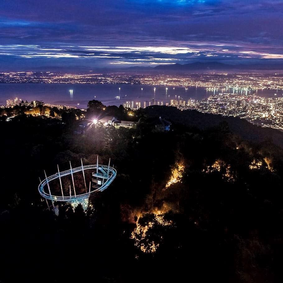 the view of the habitat at night and the penang island