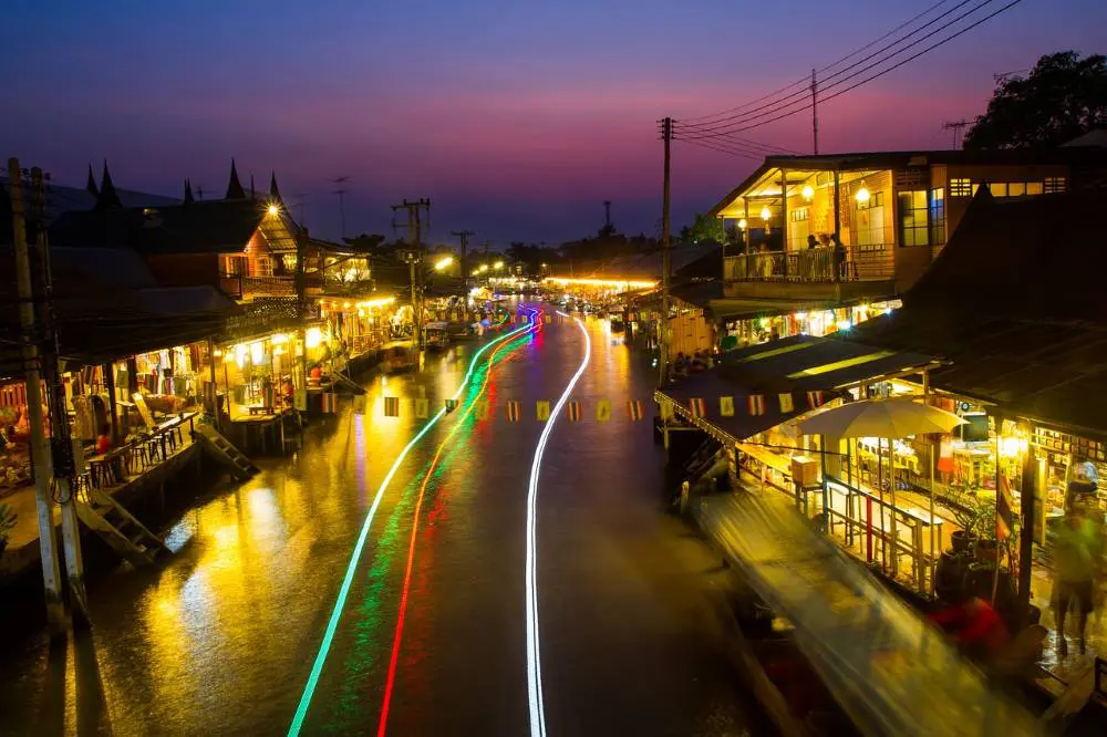the amphawa market tour normally ends in the evening with fireflies trip at the end