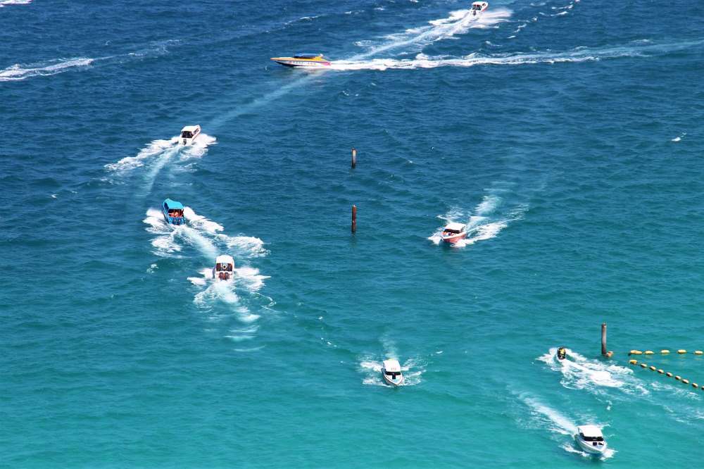 getting on the boat is among activities at koh larn pattaya