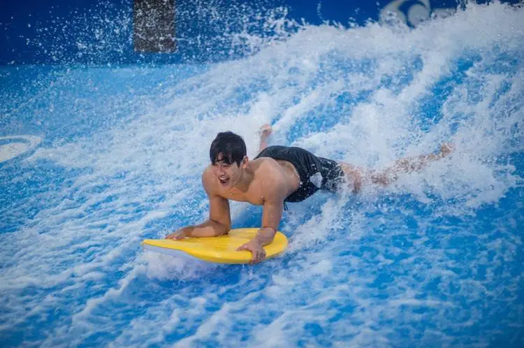a guy surfing in the vana nava hua hin jungle park