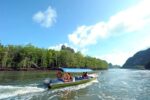 boat taking passengers during an island hopping trip package langkawi boat taking passengers during an island hopping trip package langkawi