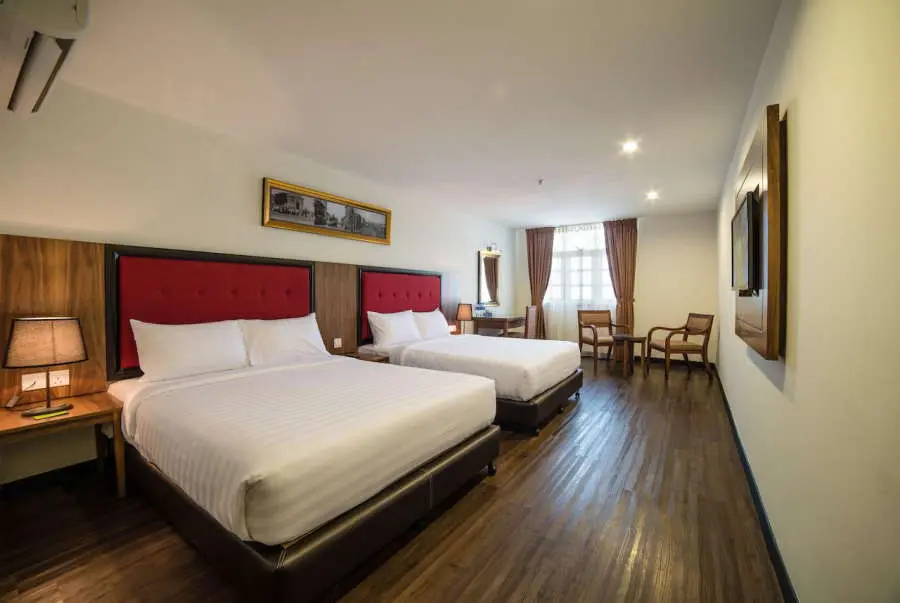 the spacious and classic looking room in the armenian street heritage hotel penang island. it is one of the budget hotel that is suitable for families on their vacation